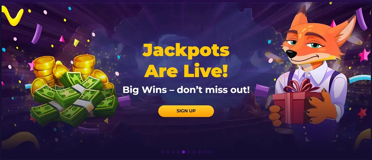 Jackpots Are Live! banner with stacks of cash and gold coins on the left, confetti over a dark purple background, and a smiling cartoon fox in a shirt holding a gift box on the right, with a yellow ‘SIGN UP’ button.